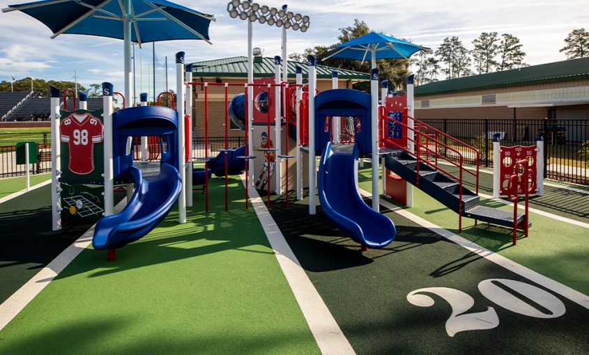 memorial stadium playground surfacing